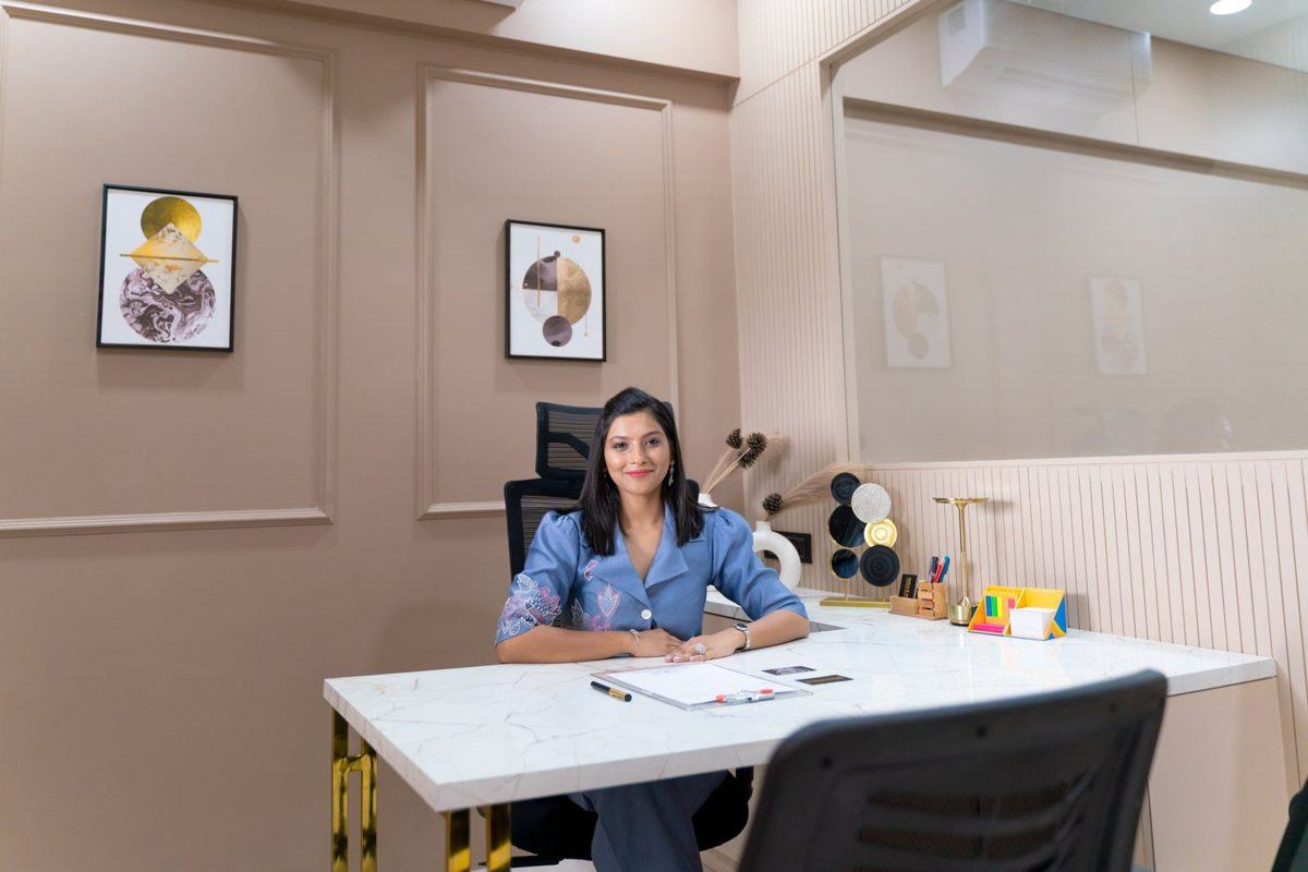 Dr. Shreya seated at clinic desk